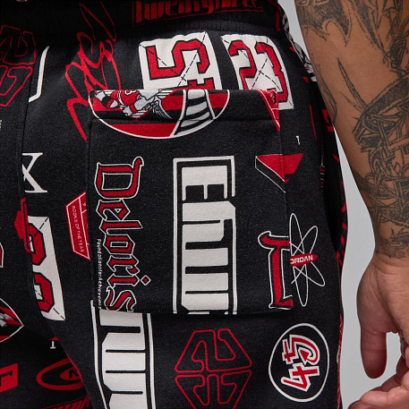 Брюки JORDAN M J ESS AOP FLC PANT