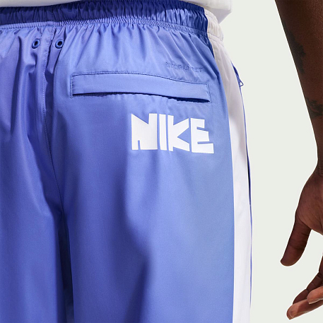 Брюки NIKE M NK WR GFX WVN PANT