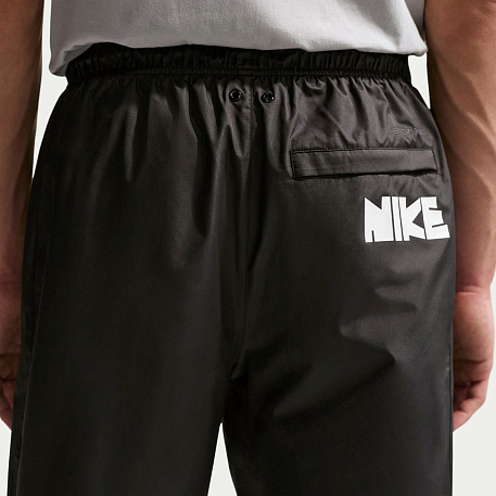 Брюки NIKE M NK WR GFX WVN PANT