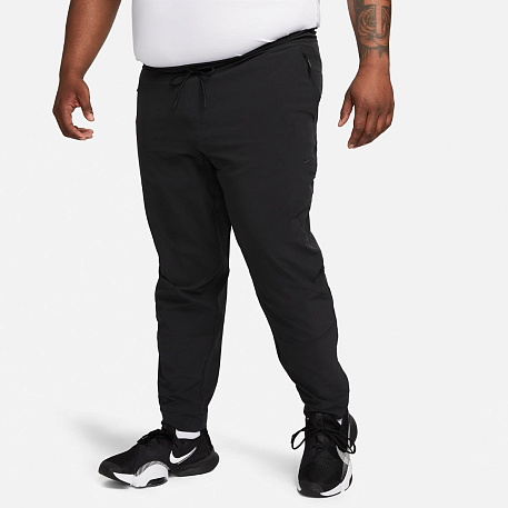 Брюки NIKE M NK Dri-FIT UNLIMITED PANT TPR