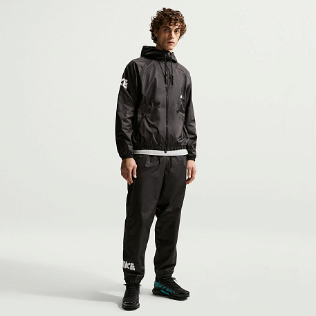 Брюки NIKE M NK WR GFX WVN PANT