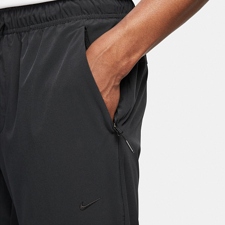 Брюки NIKE M NK Dri-FIT UNLIMITED PANT TPR