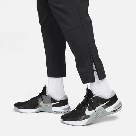 Брюки NIKE M NK Dri-FIT UNLIMITED PANT TPR
